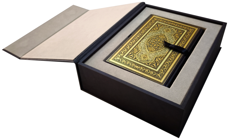 Open presentation box showing the gold-tooled facsimile volume nested in its tray