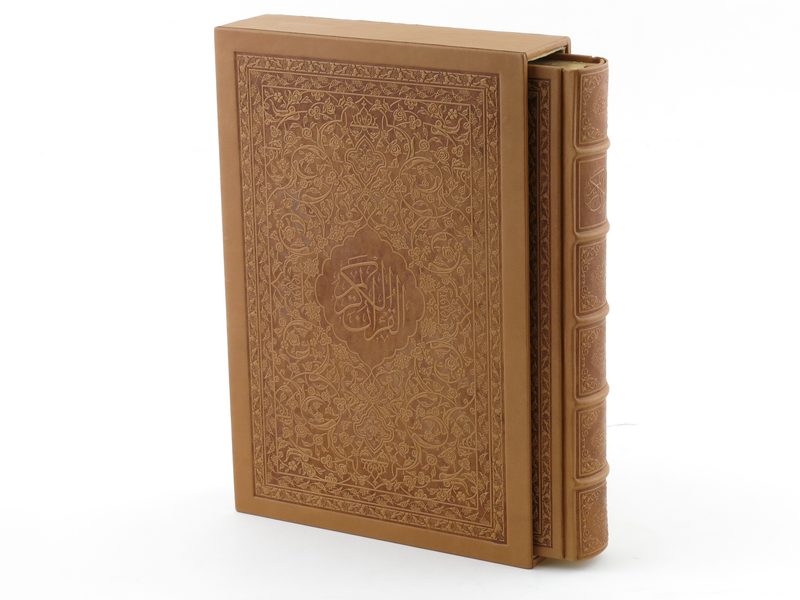 Tan leather volume with matching slipcase