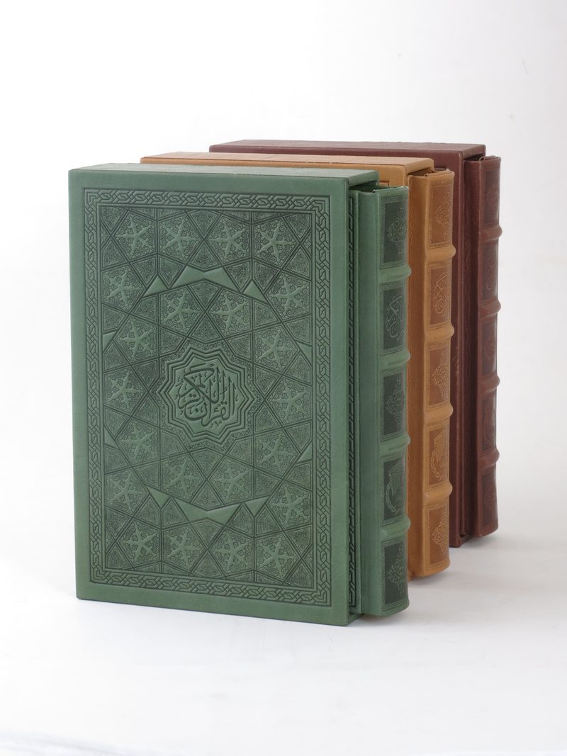 Stacked genuine-leather bindings in three finishes