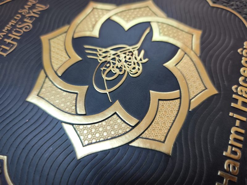 Deep floral embossing on olive leather